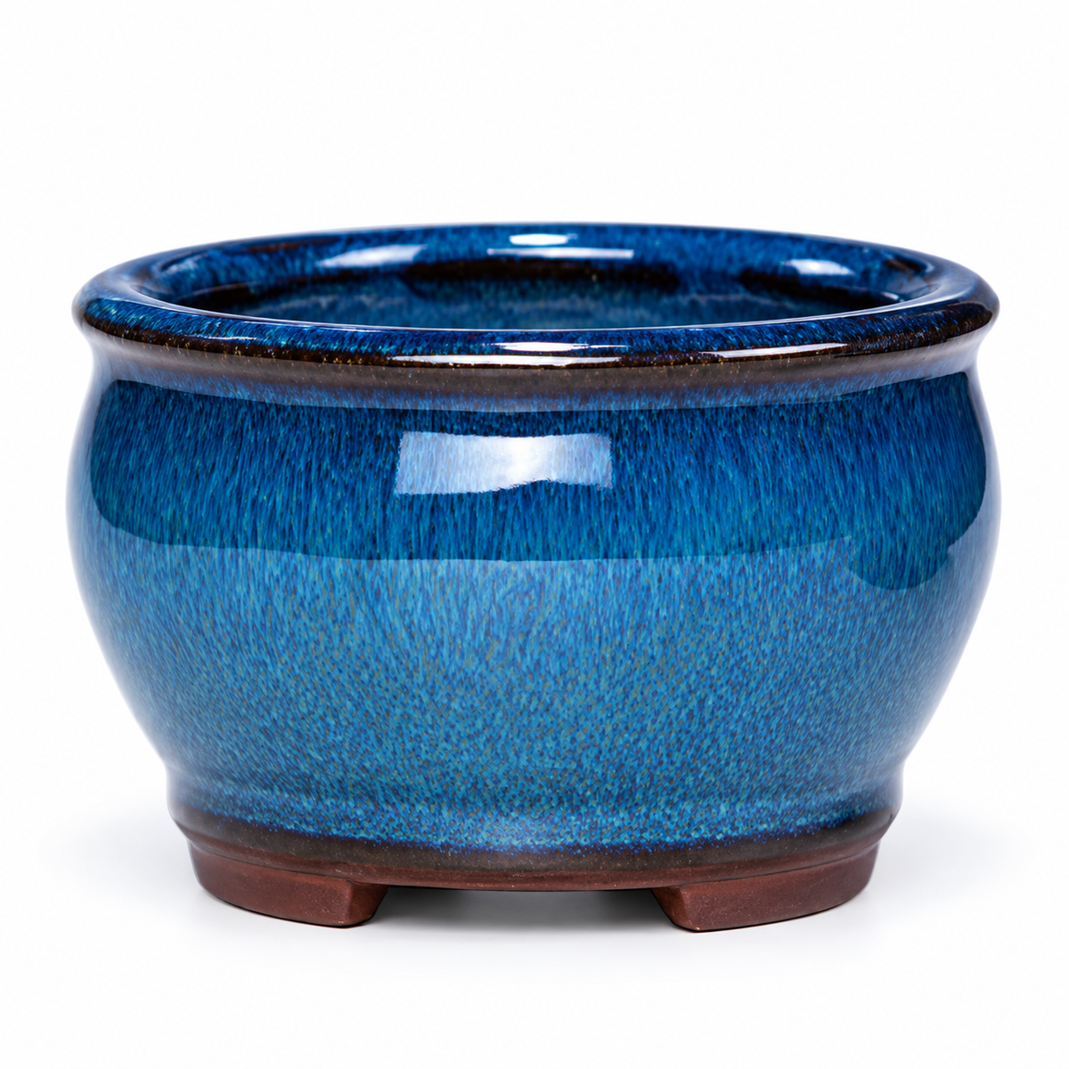 A round ceramic bonsai pot with a glossy blue glaze and a dark brown base, shown against a plain white background.