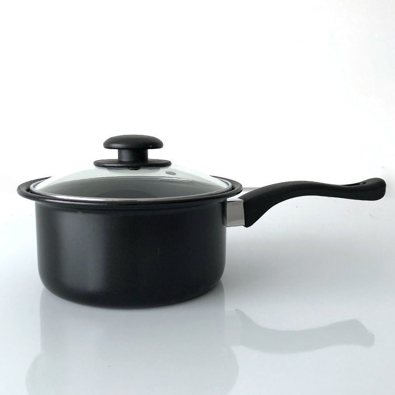 Black saucepan with a lid on a white background
