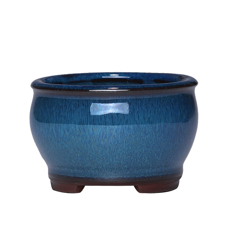 Blue ceramic pot on a white background