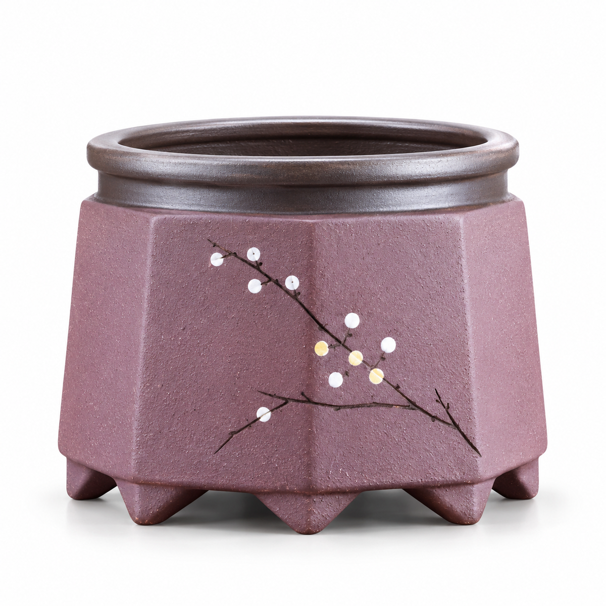 A hexagonal ceramic planter pot in a muted mauve-purple color, featuring a hand-painted branch design with white and yellow blossoms on the front, set against a plain white background.